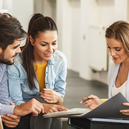 couple speaking with consultant at home