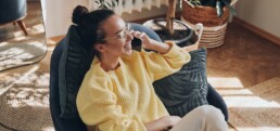 Woman on phone on beanbag chair