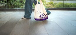 Woman carrying tote bag