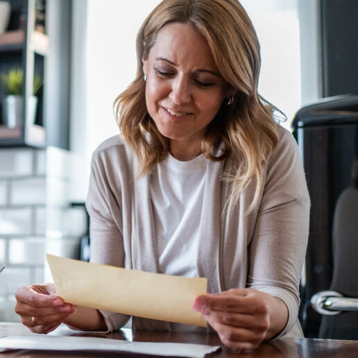 Women reading direct mail