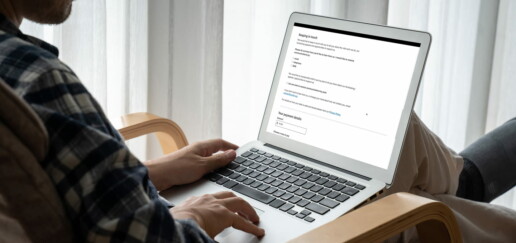Person on laptop opting in to charity