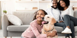 family with dog at home
